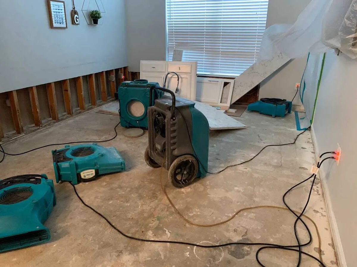 Dehumidifier in flood-cut room for Water Damage Restoration in Pittsburg